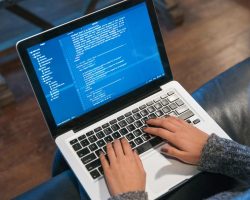 hands-typing-code-on-laptop.jpg